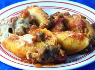 Lightened Ricotta Stuffed Shells With Italian Sausage Ragu