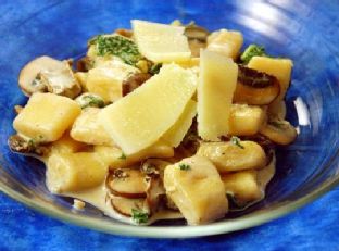 Potato Gnocchi With Kale and Mushrooms In A Goat Cheese Sauce