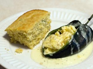 Scrambled Egg-Stuffed Poblano Chiles With Spicy Cheese Sauce